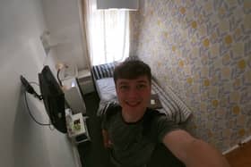 George Redfern, 21, stayed in the cheapest hotel in the UK for £16 a night. Pictured at the Coco Beach Hotel, in Blackpool.