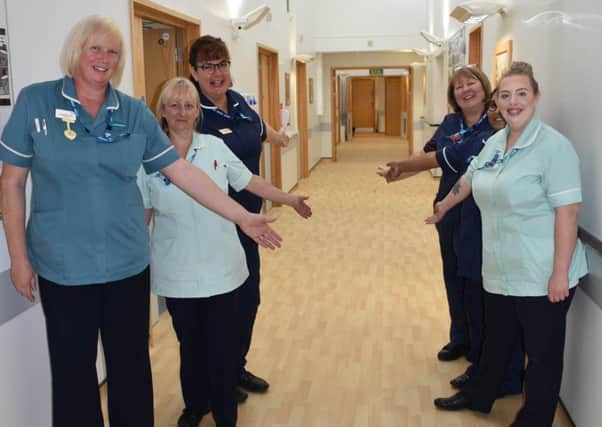 Staff show off the new flooring in the inpatient ward at Melton Mowbray Hospital after an extensive programme of refurbishment was carried out EMN-190410-131426001